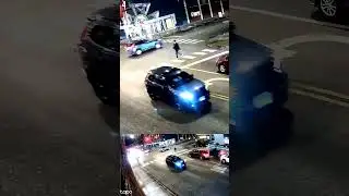 E-scooter, cars and pedestrians in Chicago reacting to an Ambulance in the evening, improved audio