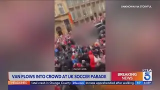 Van plows into crowd at UK soccer parade