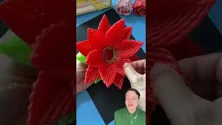 asi puedes hacer una flor con material reciclado
