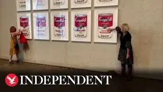 Climate protesters glue hands to Andy Warhol&rsquo;s Campbell&rsquo;s Soup Cans artwork
