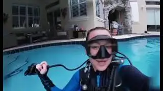 woman sings Christmas songs underwater