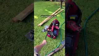 Plumber fixing a burst pipe