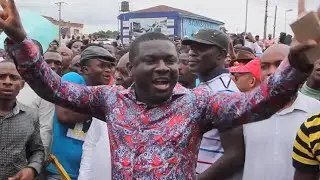 People take to streets to protest against election violence in Nigeria