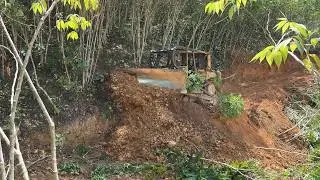 Bulldozer D6R XL and the Acceleration of Mountain Road Development