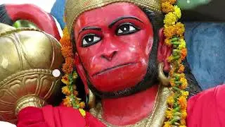 Why is Lord Hanuman's body covered with Red/Saffron Sindoor?