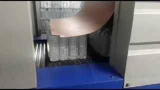 Full automatic shrink wrapping machine