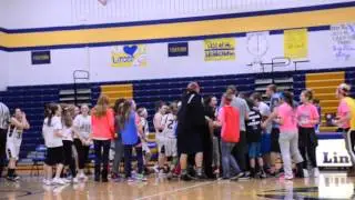 Spencerville Fans storm the court