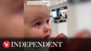 Adorable baby reviews high end candles in viral TikTok