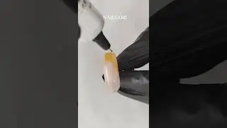 Modern French tip with a warm amber shade