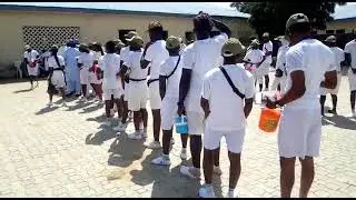 Corp members queue for food at Kano NYSC camp [Vivid Experience]