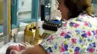 One hour old baby first check up - good girl!