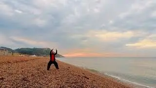 Phoenix in Clouds of blessings, on Seaton Beach, Devon @whitehorsetaichi