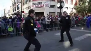 Cops hold dance off in the middle of a Mardi Gras parade