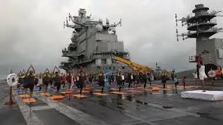 Indian Navy personnel perform Yoga onboard INS Vikramaditya  on 10th International Yoga Day