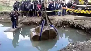 Psamtik I colossus torso emerges from underground water in Cairo
