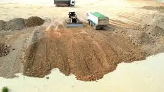 Technique Landfill Process Bulldozer Moving dirt Large Capacity Dump Truck Unloading