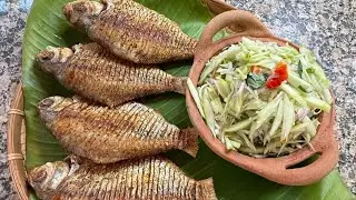 Deep fry fish with green mango Cambodian dish.