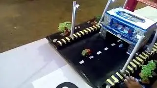Science exhibition model of transit elevated bus with automatic street light