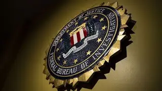 FBI Chief: Russia Seeks to Stop Biden From Winning