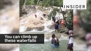 You can climb up these cascading waterfalls in Jamaica