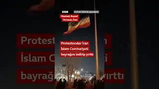İran'da protestocular İslam Cumhuriyeti bayrağını indirip yırttı