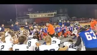 Catholic Football Teams Pray Together After Game