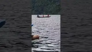 Filming these 3 people while kayaking into the other side