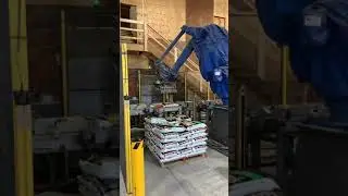 Robot for stacking bagged products