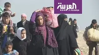 نزوح عشرات العائلات من الموصل مع احتدام المعارك