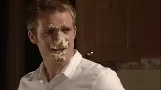 Chris Fountain gets a cake in the face