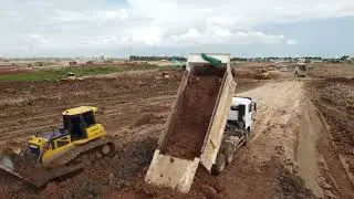 The Perfect Operator: Mud Soil Huge Landfilling Up Bulldozer Rolling Mud Dump Truck  Unloading Dirt