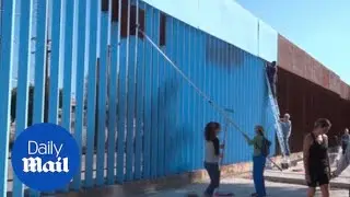 Artist explains why she's making border fence 'disappear' - Daily Mail