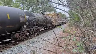 CSX 7276 and CSX 903 lead a south bound mixed freight train Sunday evening 12/28/2025