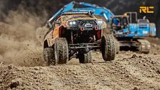 RC Monster Trucks compete in a dangerous mountain climbing challenge