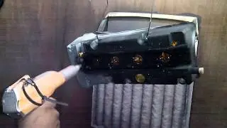 Applying powder coating at Coated By Dynatech facilities