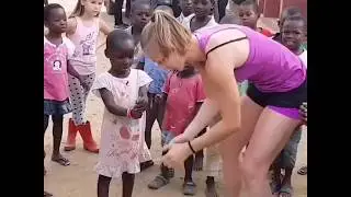 There are still Good Peoples in the World. A White Girl Playing with Black Kids And making Fun.