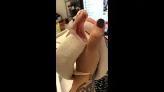 Snake, Held by Owner, Opens Its Mouth Wide as if It Is Yawning