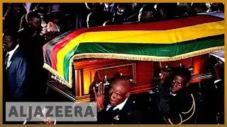 Robert Mugabe's body arrives in Zimbabwe amid mystery over burial