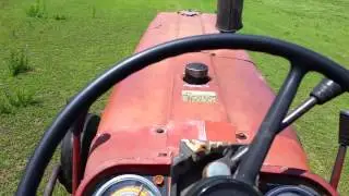 Bushhoging with a1976 International 666.