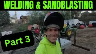 TRAILER BUILD-Welding & Sandblasting on the rack over the tool box.