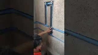 Installation of hot and cold water pipes in bathroom