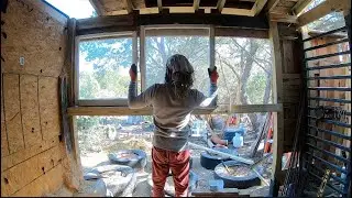 51. Trash House. Installing recycled windows, Starting a mud roof.