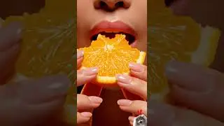Biting a Glass Orange Slice (ASMR Slow Motion) #asmr #satisfying #viral #relaxing