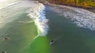 Surfing at Sunset on Gold Coast by Drone