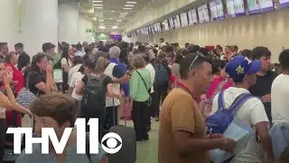 Travelers scramble as global computer outage continues causing delays