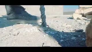 Drilling holes in the ceiling with a 24-bit drill