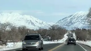 Snowcapped mountains going through Santaquin, Utah
