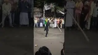 A boy playing a Akhara in                     MUHARRAM