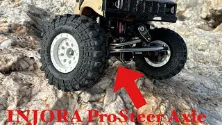 INJORA Pro Steer Double Joint Aluminum Axle.