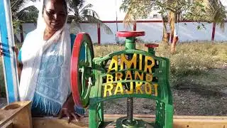 RASHIDA ISMAIL SAIYAD, A WIDOW from Lajpore receives Ice-Candy Machine Hand Cart